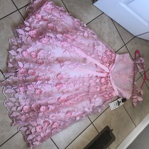 this is the brand rare editions. NEVER WORE! is a child’s dress.